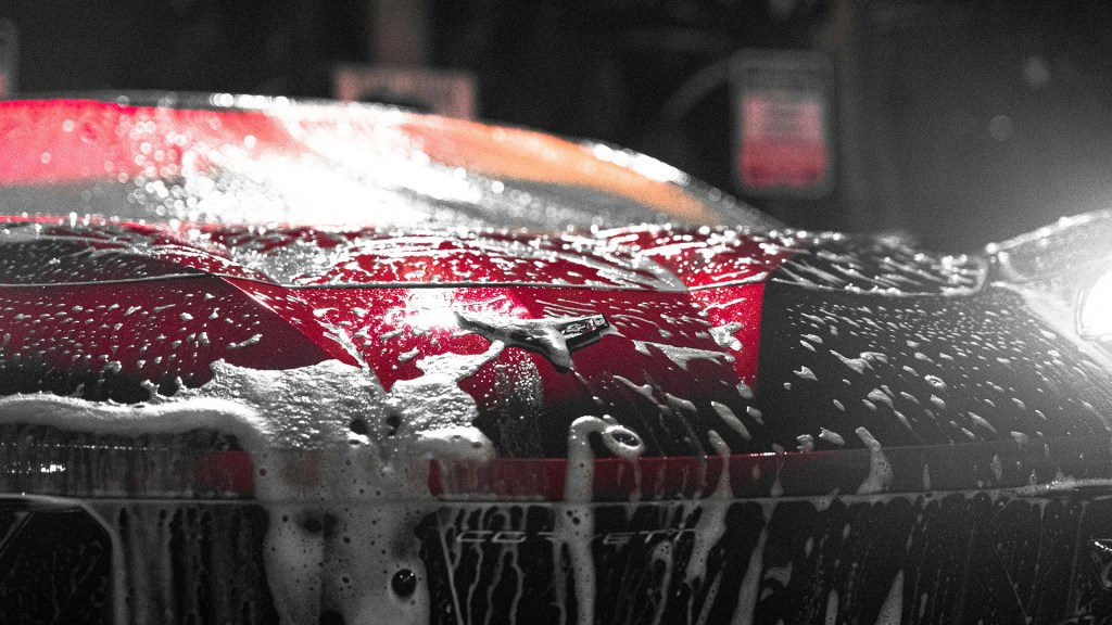 Corvette getting washed with triple foam